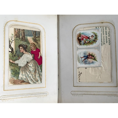 266 - A small photograph album containing a quantity of late 19th and early 20th century postcards, drawin... 