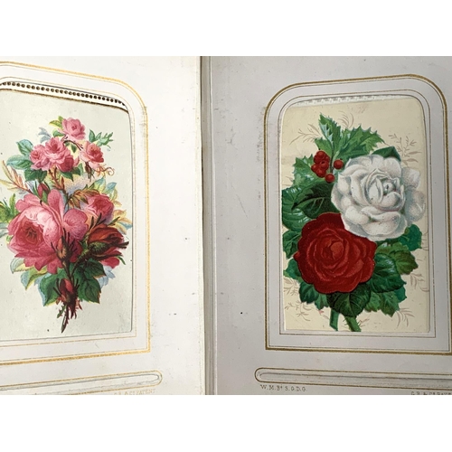 266 - A small photograph album containing a quantity of late 19th and early 20th century postcards, drawin... 