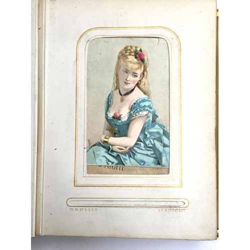 266 - A small photograph album containing a quantity of late 19th and early 20th century postcards, drawin... 