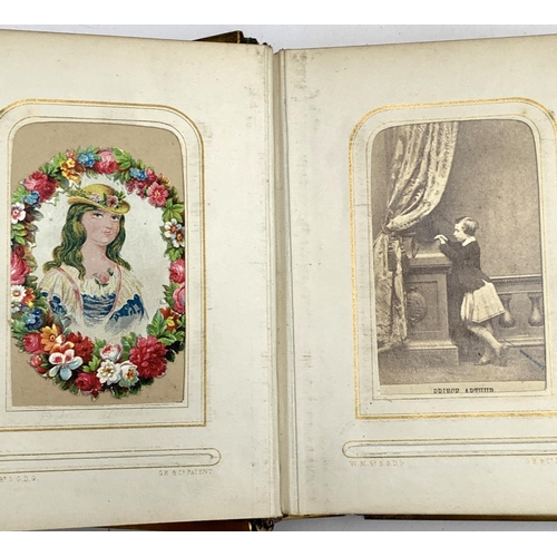 266 - A small photograph album containing a quantity of late 19th and early 20th century postcards, drawin... 