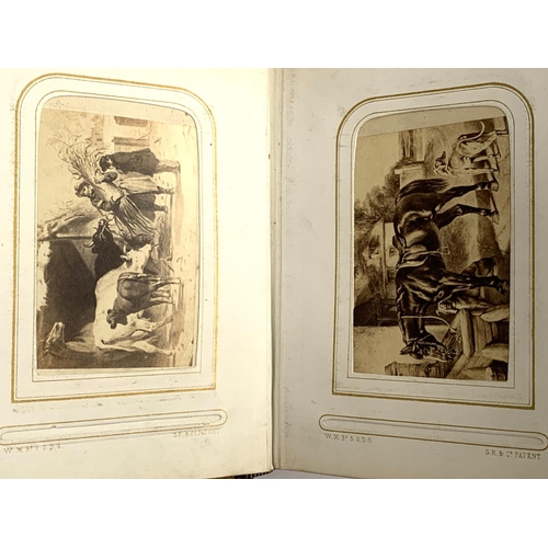 266 - A small photograph album containing a quantity of late 19th and early 20th century postcards, drawin... 