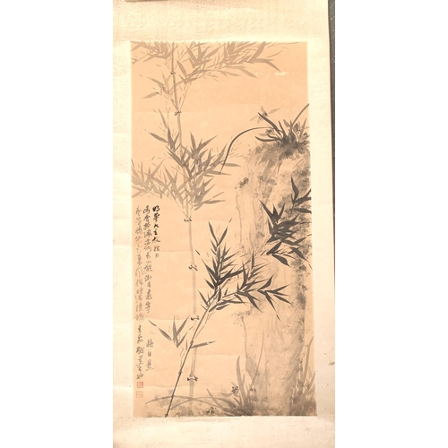 2451 - A Chinese scroll depicting bamboo, 124x56.5cm overall complete