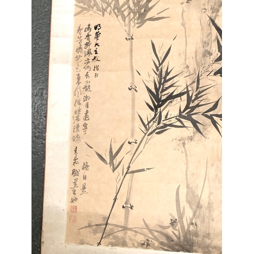 2451 - A Chinese scroll depicting bamboo, 124x56.5cm overall complete