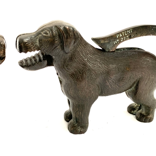 287 - A pair of novelty nutcrackers in the form of dogs, patent number 273480, 23cmL