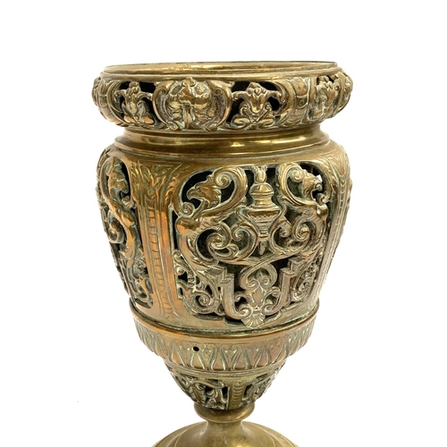 288 - A heavy brass urn, pierced rococo style design, with copper lining, 31.5cmH