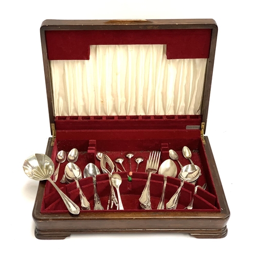 115 - A stained oak canteen of various plated and stainless steel cutlery, together with two silver teaspo... 