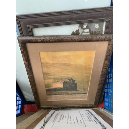 290 - A box containing a quantity of framed prints and a watercolour