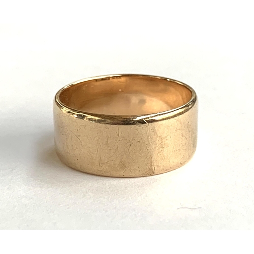 51 - A wide 9ct gold band, approx. size R, 6.4g