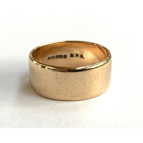 51 - A wide 9ct gold band, approx. size R, 6.4g