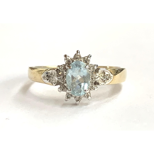 52 - A 9ct gold ring set with an aquamarine and diamonds, size M, approx. 2g