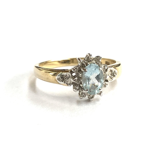 52 - A 9ct gold ring set with an aquamarine and diamonds, size M, approx. 2g