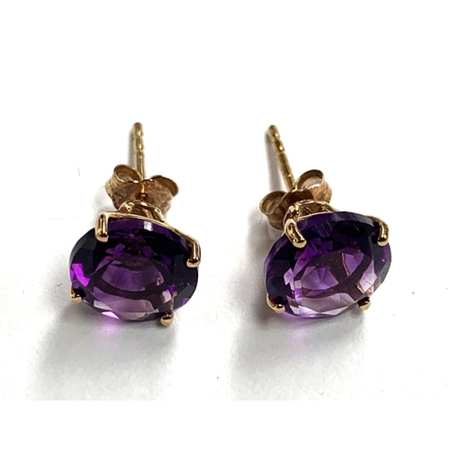 58 - A pair of 9ct gold amethyst stud earrings, 0.7cmD, 1.2g