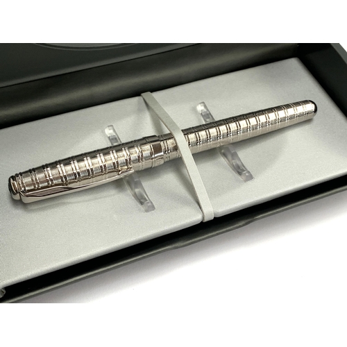 374 - A boxed Parker Sonnet ballpoint pen; together with a further Parker pen, a Cyrea ruler and letter op... 