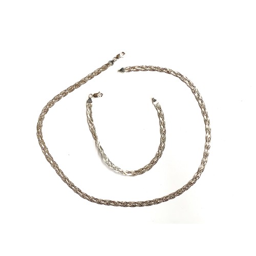 64 - A 9ct white gold woven chain, 44cmL unclasped, together with a matching bracelet, gross weight 7g