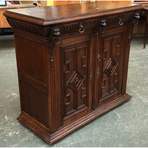 574 - A 20th century mahogany buffet, four drawers with brass handles above a shaped undershelf, on taperi... 