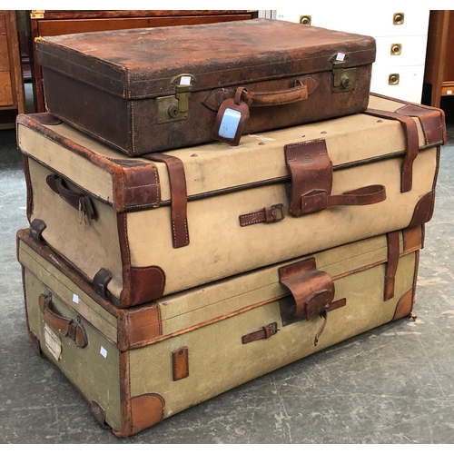 675 - Two early 20th century Bick Bros Cheltenham leather banded canvas travel trunks, 90cmW; together wit... 