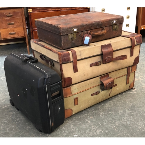 675 - Two early 20th century Bick Bros Cheltenham leather banded canvas travel trunks, 90cmW; together wit... 