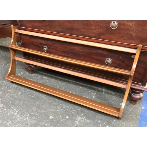 687 - An Ercol elm wall shelf, 97cmW