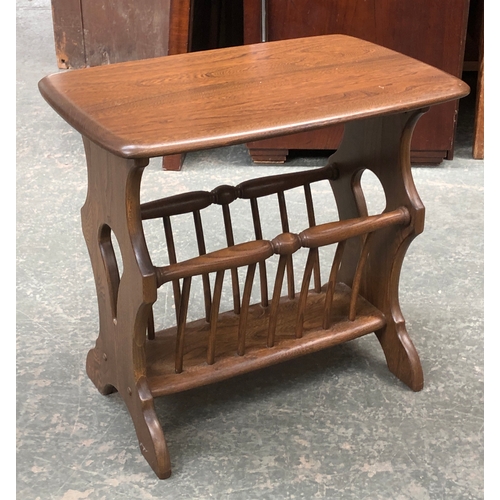 690 - A pair of Ercol elm occasional tables, each 46x37x38cmH; together with an elm Ercol magazine rack, 5... 