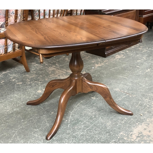 694 - An Ercol elm extending D end dining table, 103x88x73cmH