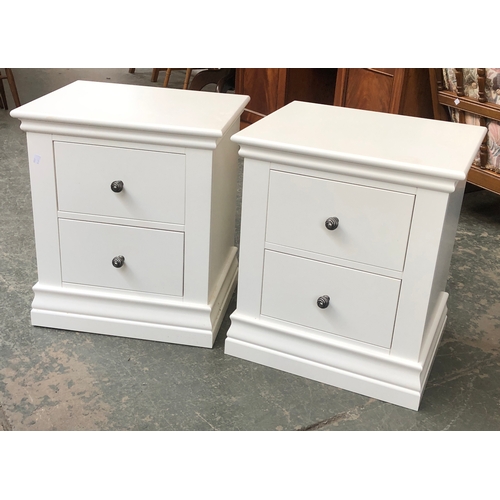 696 - A pair of modern white bedside cabinets, each with two drawers, 61cmH