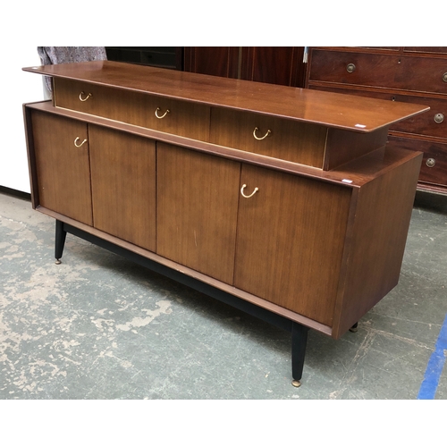 719 - A G plan E Gomme mid century sideboard, two drawers over bi-fold cupboards, on ebonised legs, 150x46... 