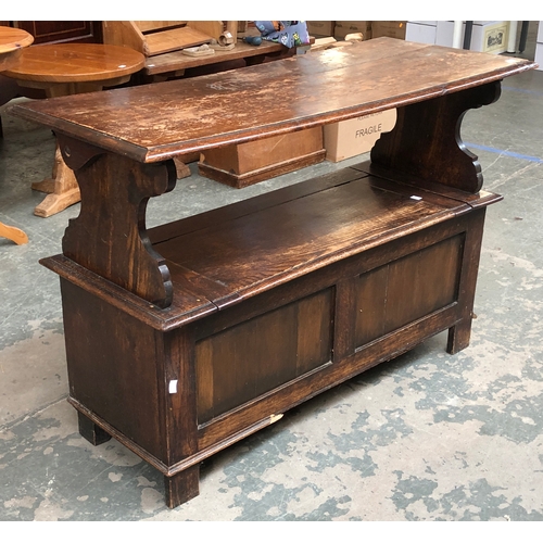 720 - A small 20th century oak metamorphic monks bench/settle, 108x44x73cmH