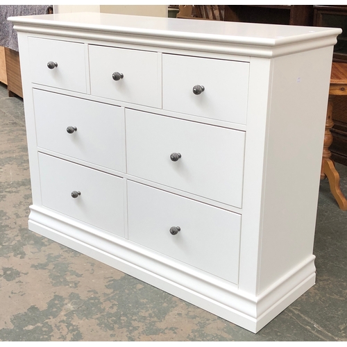 721 - A white chest of three/two/two drawers, 124cmW