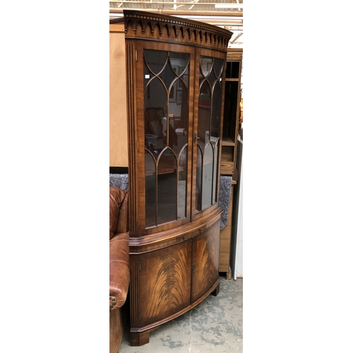 740 - A glazed Reprodux standing corner cupboard, 88x55x189cmH