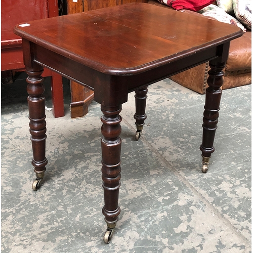 664 - An exceptionally small 19th century extending mahogany table, with two spare leaves, on turned legs,... 