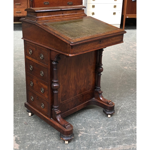 684 - A Victorian walnut and line inlaid davenport desk, the hinged superstructure with letter rack, fall ... 