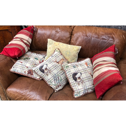 736 - A quantity of scatter cushions to include 'Sport and Tradition' pattern