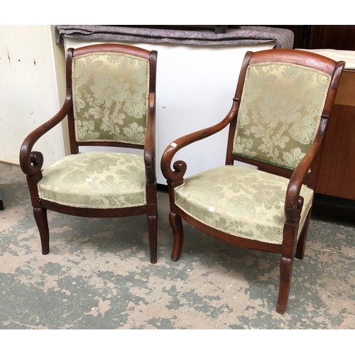 748 - A near pair of continental open mahogany armchairs, 57cmW