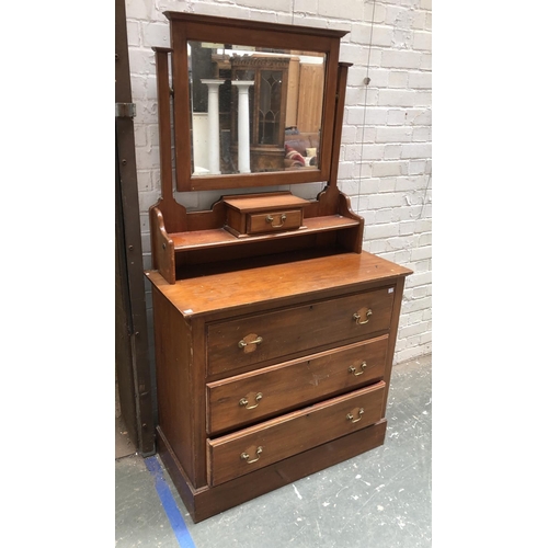 753 - A dressing table chest of three drawers with mirrored upstand, the chest 91x42x81cm, the mirrored up... 