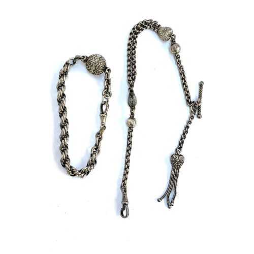 35 - A silver Albertina chain with puffy heart tassel and T bar, 22cmL unclasped; together with a further... 