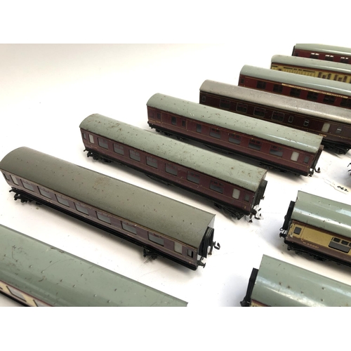 394 - A quantity of Hornby OO gauge passenger rolling stock to include LMS corridor coach 4183, BR corrido... 