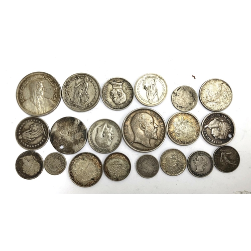 82 - A quantity of silver coins to include one rupee India 1910, Switzerland 5 francs 1940, George III sh... 