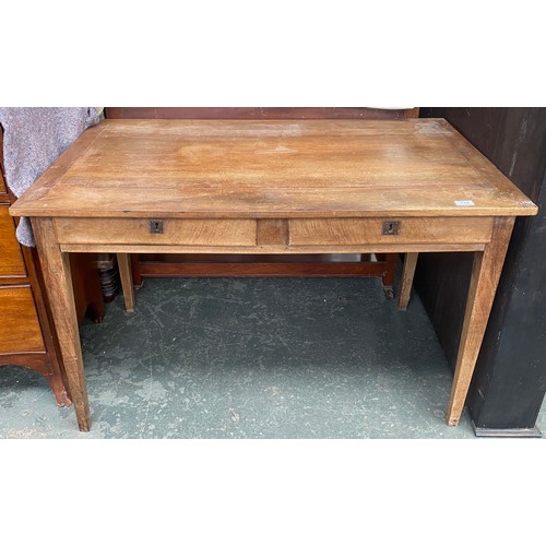 819 - A fruitwood kitchen table, with two drawers, on square tapered legs, 114x72.5x71cmH