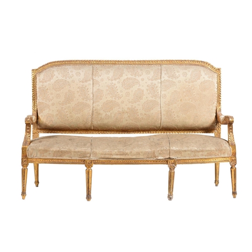 437 - A giltwood and upholstered sofa in Louis XVI style, second half 19th century, 160cm wide, 55cm deep,... 