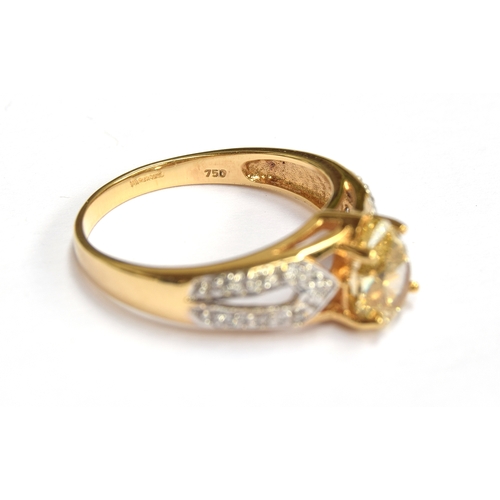 57 - An 18ct gold ring set with a large pear shaped Argyle fancy yellow diamond, the yellow diamond measu... 