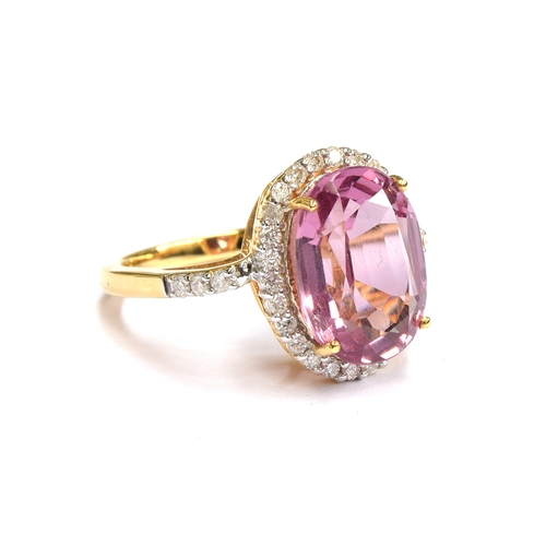 96 - An 18ct gold Pamir pink spinel and diamond cluster ring, the spinel measuring 13x9mm and weight 6.8c... 