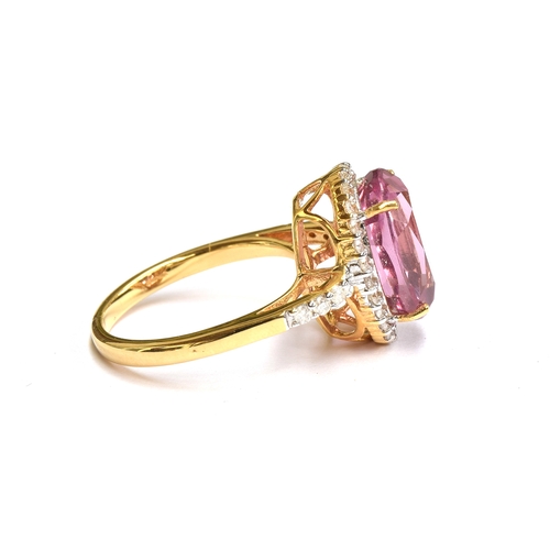 96 - An 18ct gold Pamir pink spinel and diamond cluster ring, the spinel measuring 13x9mm and weight 6.8c... 