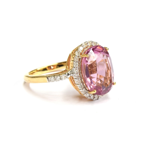 96 - An 18ct gold Pamir pink spinel and diamond cluster ring, the spinel measuring 13x9mm and weight 6.8c... 