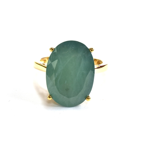 138 - An 18ct gold ring set with a large oval cut Grandidierite, the 18x13mm stone weighing approx. 13.5ct... 