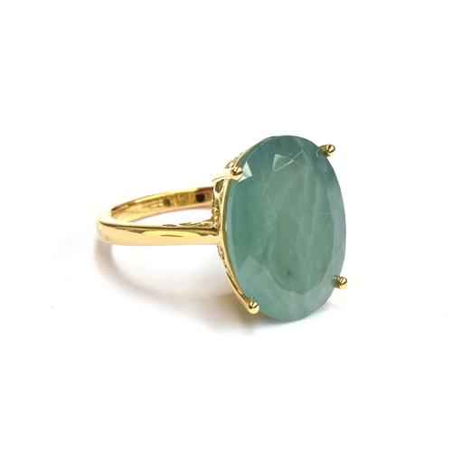 138 - An 18ct gold ring set with a large oval cut Grandidierite, the 18x13mm stone weighing approx. 13.5ct... 