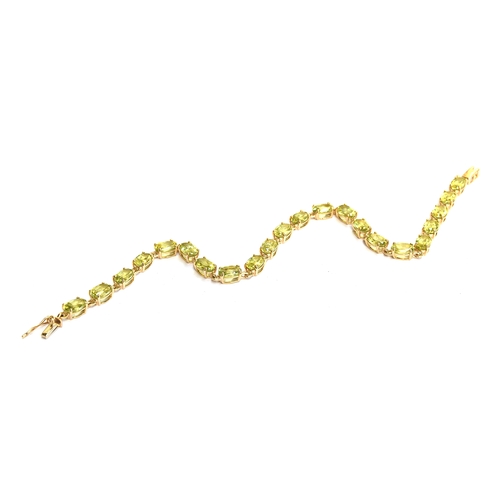 94 - A 14ct gold bracelet set with marquise cut sphenes, total carat weight approx. 10.8cts, 19cm long un... 