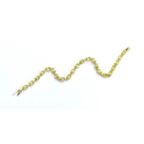 94 - A 14ct gold bracelet set with marquise cut sphenes, total carat weight approx. 10.8cts, 19cm long un... 