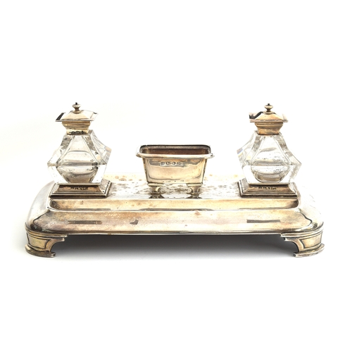 208 - A Victorian silver ink stand by Henry Wilkinson & Co, Sheffield 1845, with two cut class silver topp... 