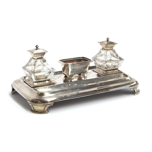 208 - A Victorian silver ink stand by Henry Wilkinson & Co, Sheffield 1845, with two cut class silver topp... 