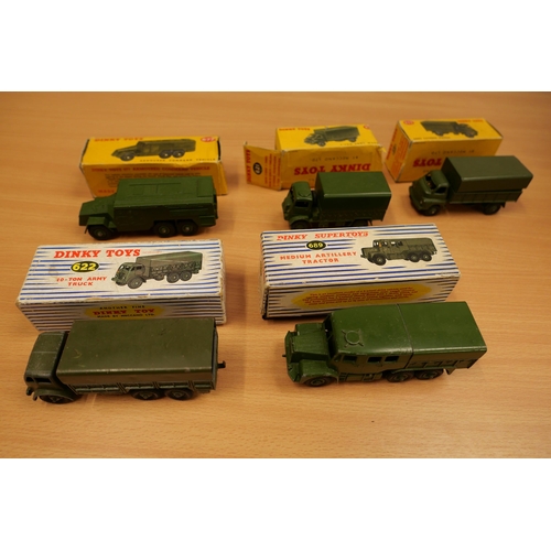 A Dinky Toys Army Covered Wagon, no. 623; a Dinky Toys 3-Ton Army Wagon no.  621; a Dinky Toys Armour